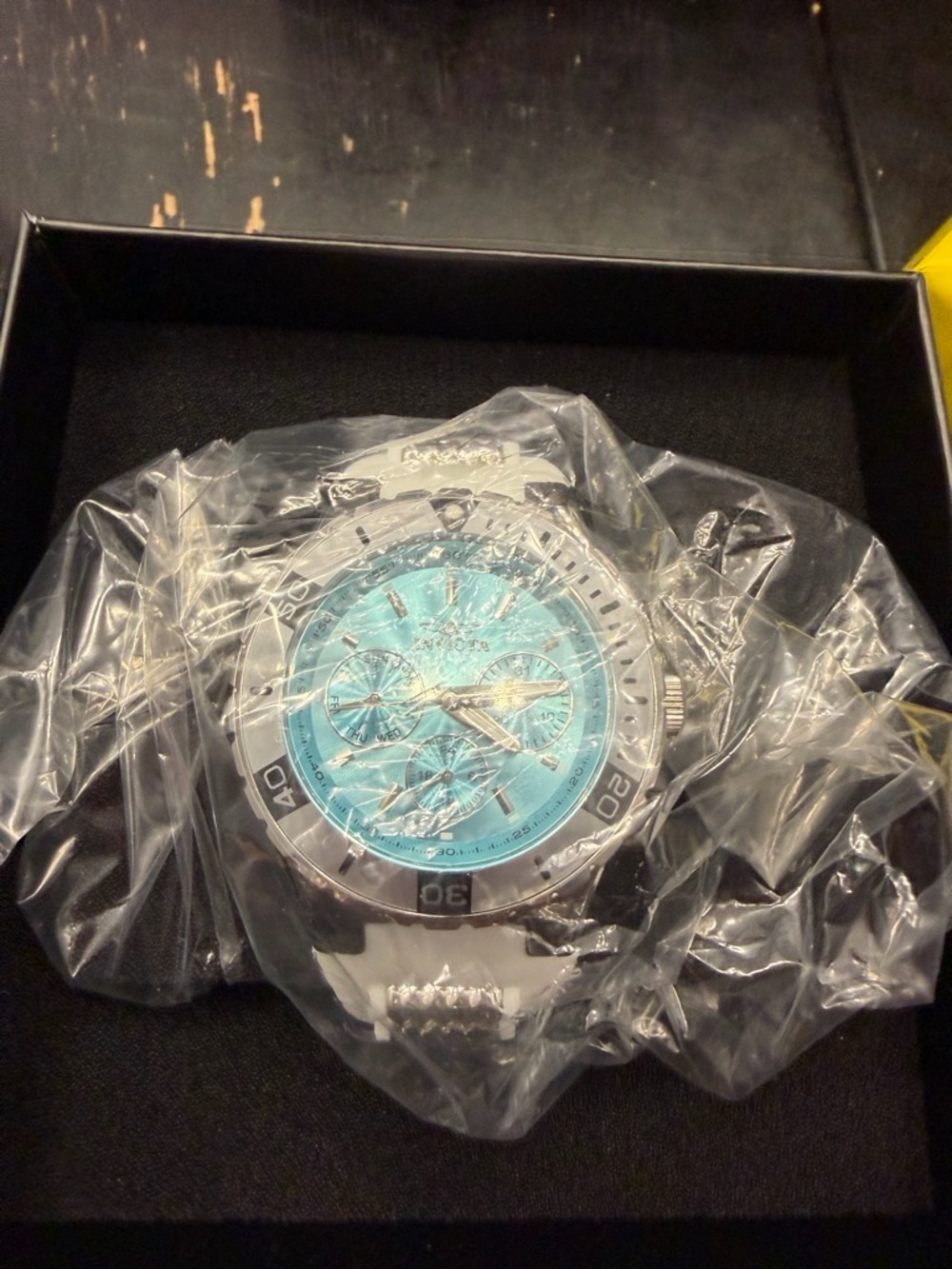 Invicta Turquoise Dial Watch with White Strap